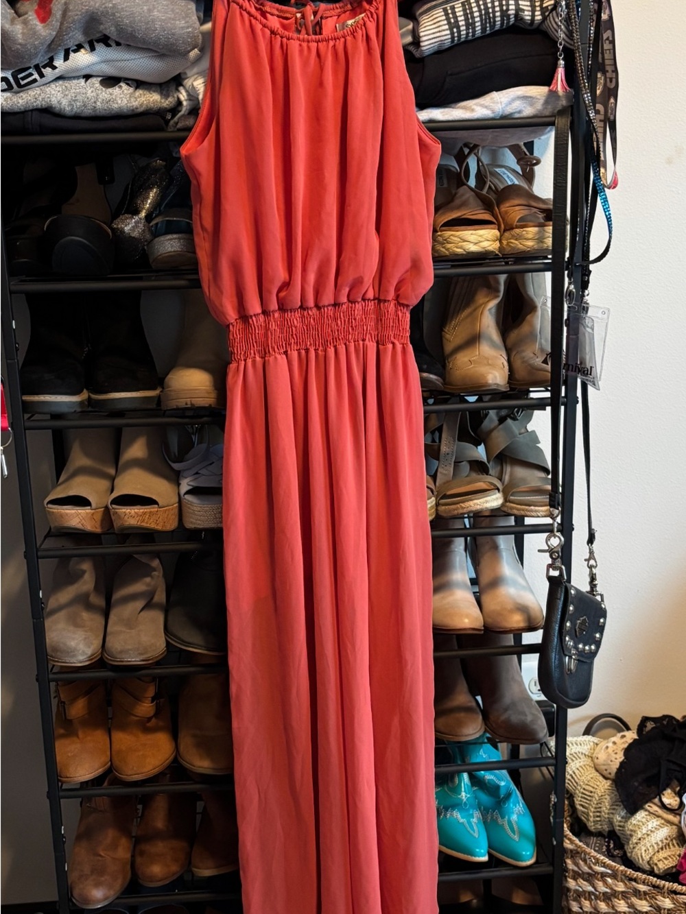 Sleeveless Coral Jumpsuit with Smocked Waistband. Sorts under split front pants.